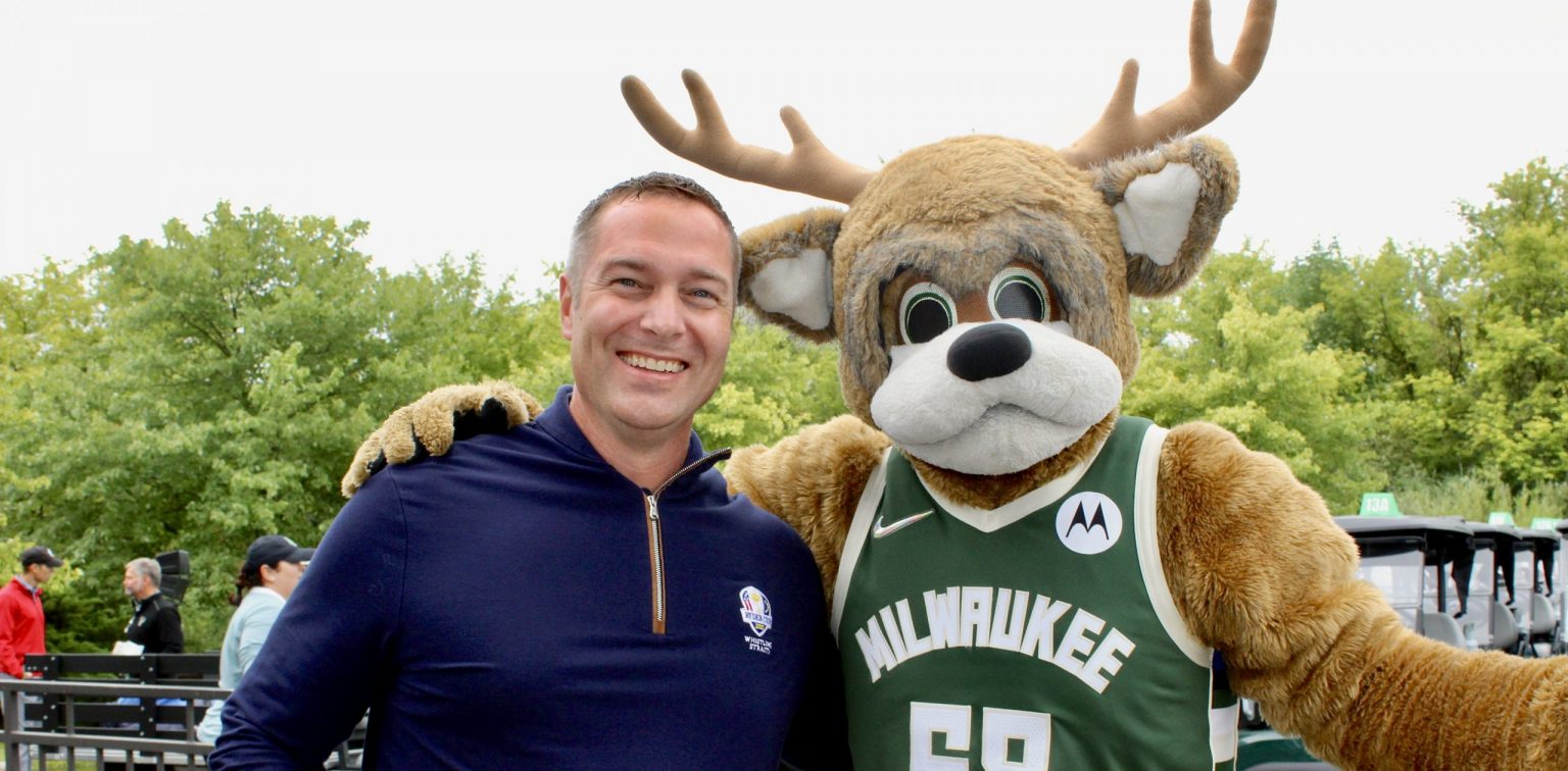 Employee with Milwaukee Bucks Bango Buck